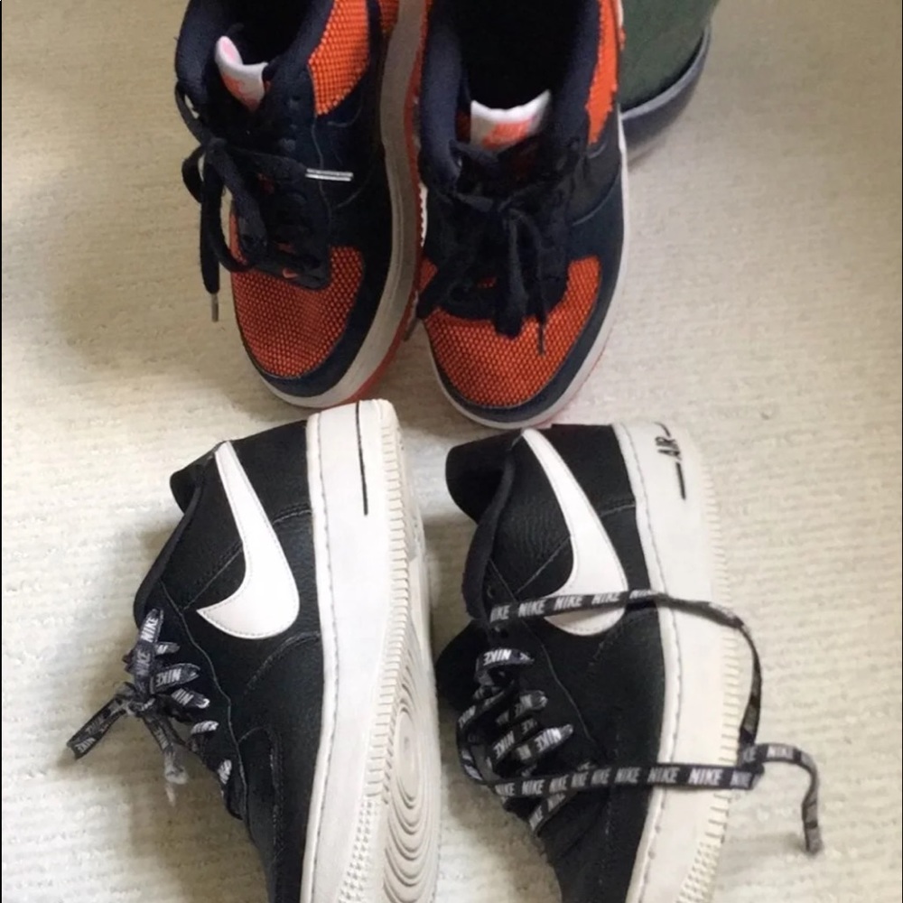 2 pairs of nike shoes